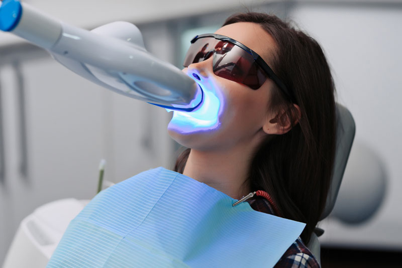 dental patient undergoing teeth whitening procedure 1